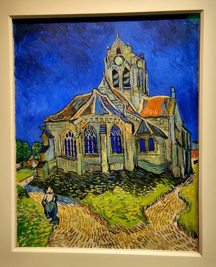 【文生·梵谷（Vincent van Gogh）於1890年創作的油畫《奧維爾教堂》（The Church at Auvers），是自殺前幾週在法國瓦茲河畔奧維爾村莊畫的。】