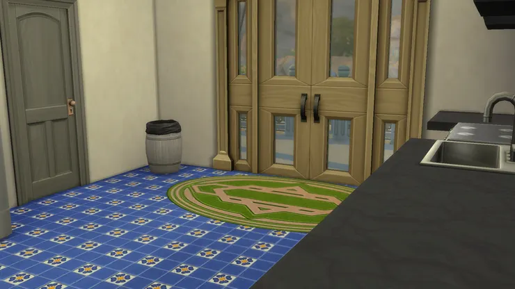 我一直都覺得這種門口地氈很髒，但有時不得不鋪。幸好廚房的地面鋪瓷磚。