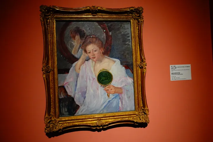 卡薩特作於1908~9年的畫--〔梳妝台前的丹妮絲〕