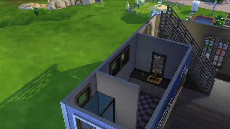 這裏是洗手間。以前都沒有間牆、搞這搞那的，但看到有些豪宅有很多間隔，便加了上去。