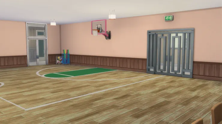 禮堂後半截裝潢成半個籃球場。