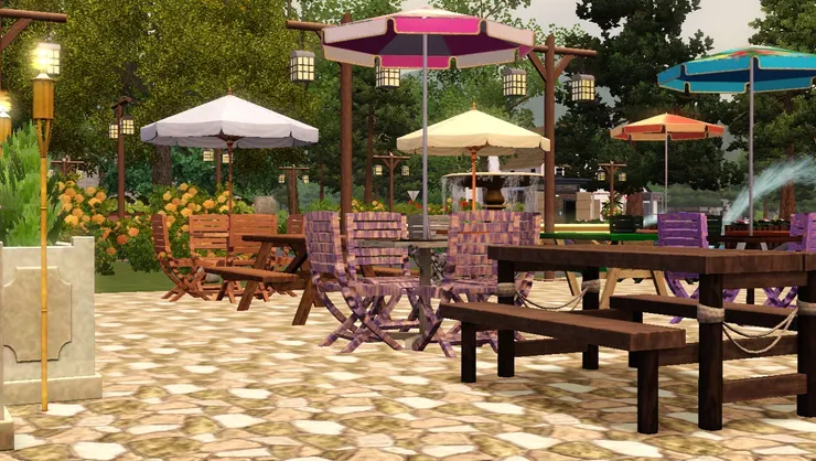 每組餐桌椅跟太陽傘的花款顏色都不同，置身其中連心情也會變好。