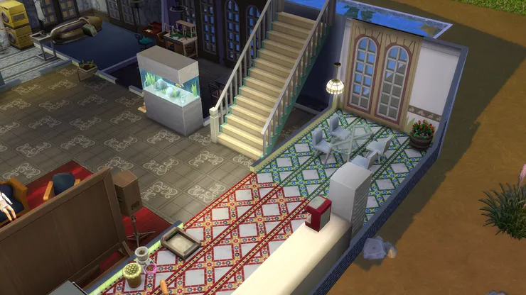 廚房跟飯廳相連，用了不同顏色的地磚來區別。我很喜歡這款花碌碌的磚！