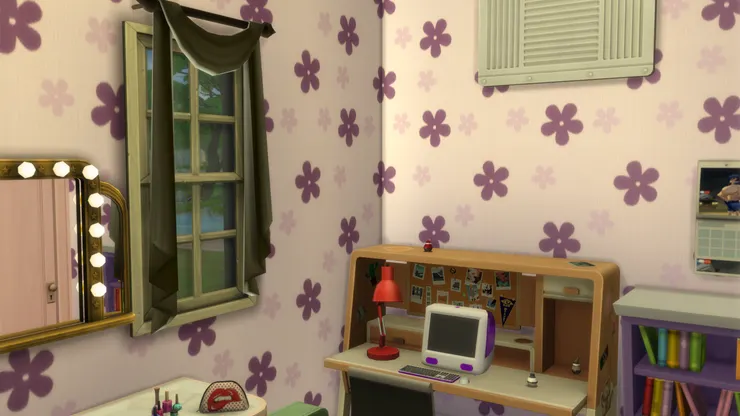 先來看看女孩子的房間,當然是很可愛和女性化,所以用了粉紅色配紫色小花的壁紙。