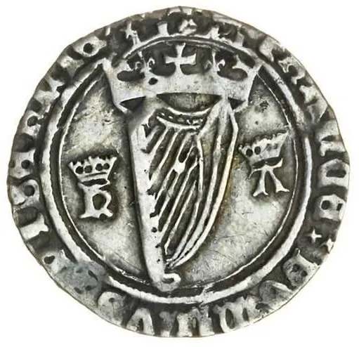 象徵愛爾蘭的豎琴被加上了英國皇冠，反映了當時的政治處境。 ( 圖片出處：The Old Currency Exchange )