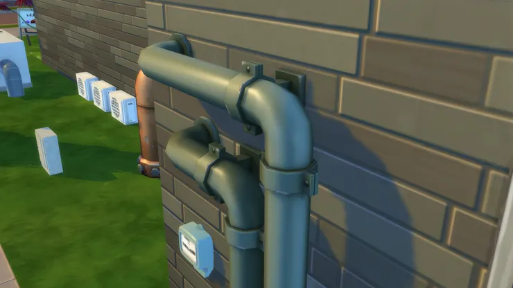 因此洗手間的外牆有水管。