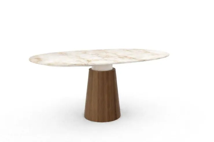 ▲NATUZZI Pan茶几除外觀上以烤漆底座搭配表面大理石材質；高度亦大改革，介於傳統餐桌及茶几間的高度，適用正式與休閒兩種不同的使用場景。