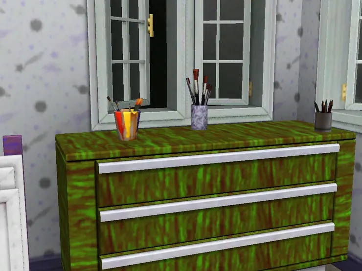 這個櫃子用來存放顏料和繪畫用品。