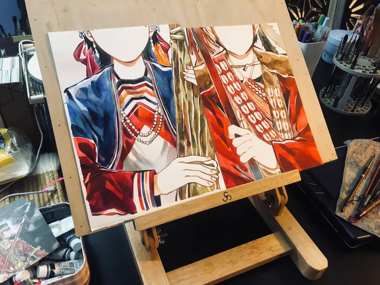 畫水彩時,總會堆滿各式工具的畫桌。