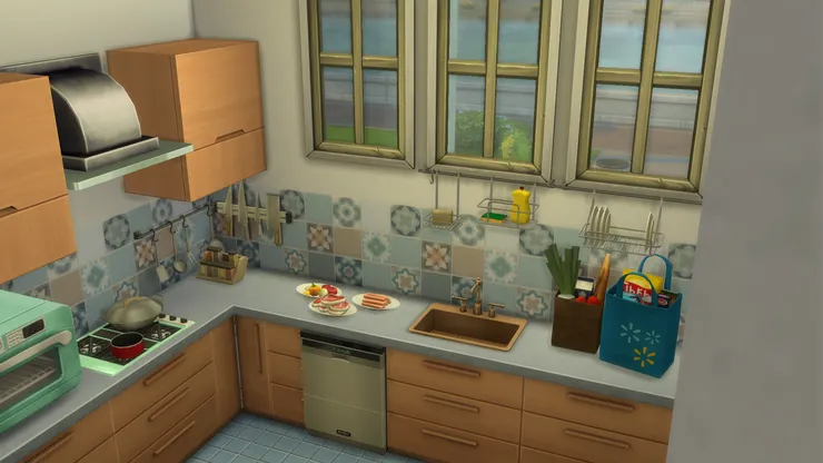 洗手盆安裝窗前，可以看著花園洗盤子和洗菜。