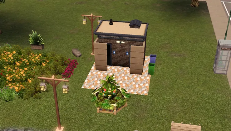 我特意在公廁前擺個很漂亮的花圃，畢竟公廁是很必要，但不討喜的地方。