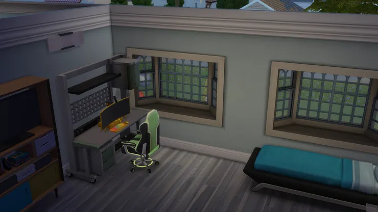 書桌是綠色的。男生房間就以冷色為主色。