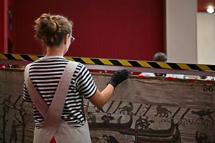 圖片來源:LOU BENOIST / POOL/AFP