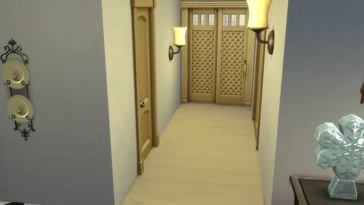 走廊各通房間和洗手間，全部的門外形雖然不同，但都是同一種顏色，仍然有一致的感覺。