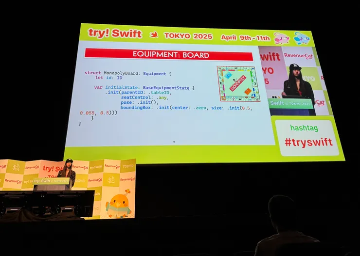 講者正在分享如何實作一個 MonopolyBoard