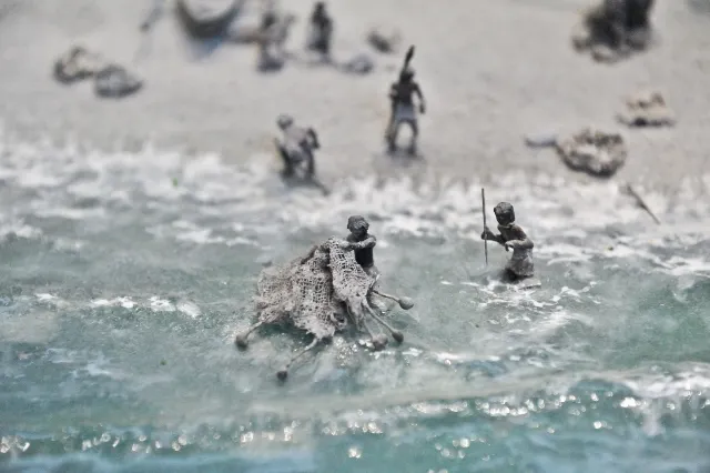 石網墜的用途示意（圖片來源：台史博線上博物館）