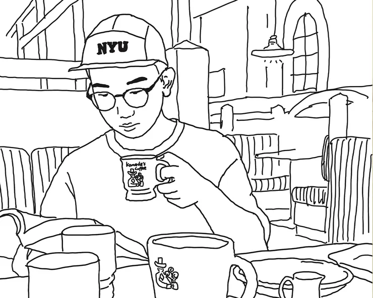 這是我，我朋友幫我畫的，我很喜歡。我正在喝咖啡，也正在沉下來。