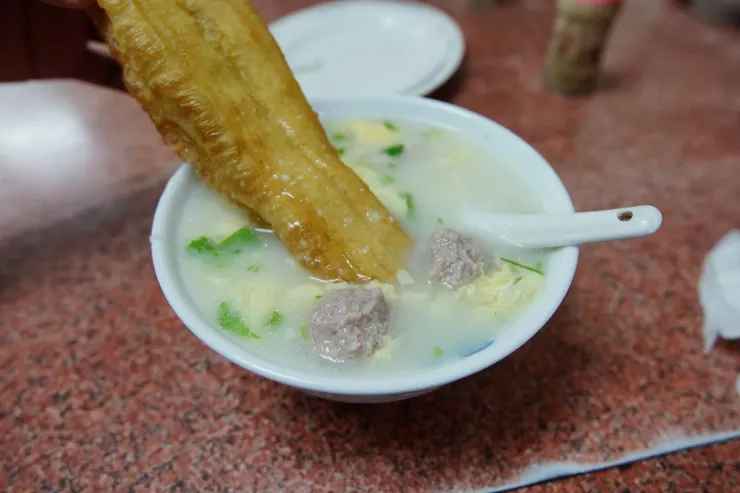 吃法一泡入粥內吸收湯汁