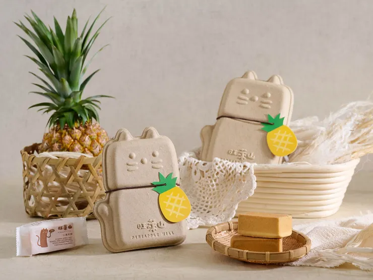 圖說:超萌旺萊貓造型禮盒,以鳳梨葉中的天然鳳梨纖維與再生紙漿製作而成,將農業廢棄物降到最低,致力於推動鳳梨全果應用。(資料來源:旺萊山)