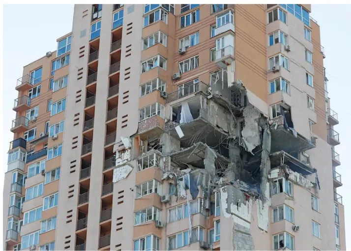 The shelling caused extensive damage to the Kyiv apartment building. (Reuters: Gleb Garanich)