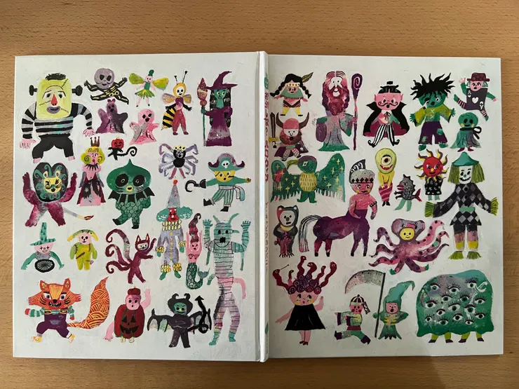 作者的小巧思,封面封套拿下來畫了許多奇奇怪怪的人物,真的是對應故事主題「奇奇怪怪!怪怪奇奇!萬聖節」