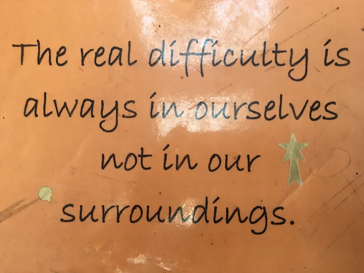 來自於Sri Aurobindo Yoga Mandir樓梯間的海報