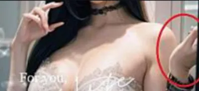 失敗案例：左手畫成右手的樣子。右手細得很異常