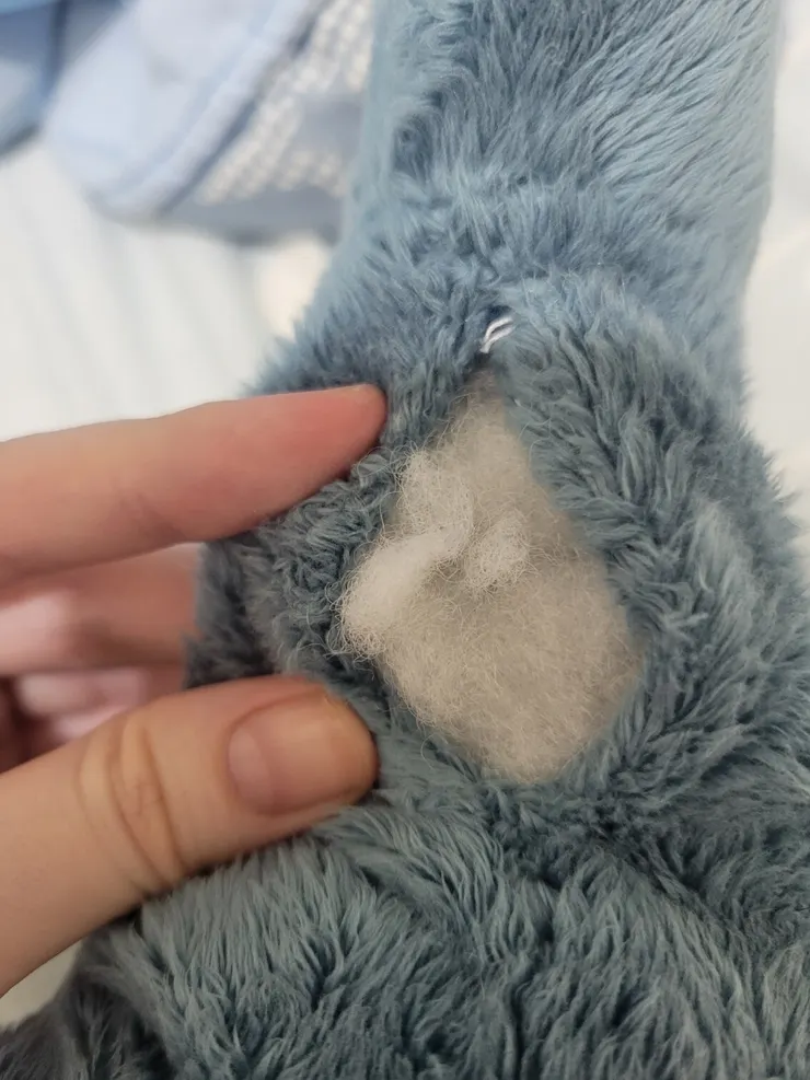 把舊棉花清出後，再填入新棉花