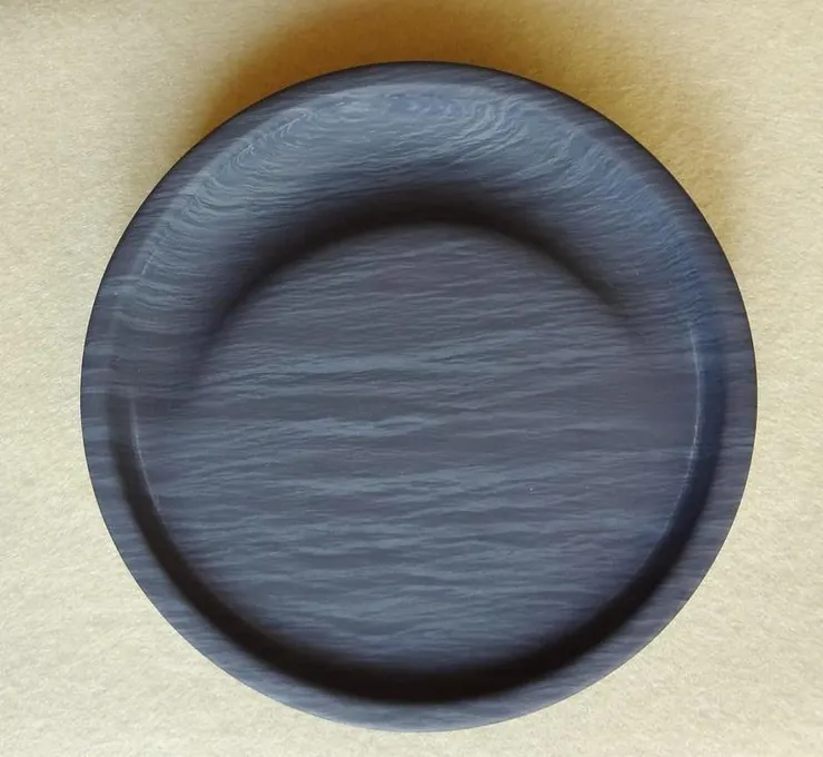 筆為耙,硯為田,硯台的紋理千變萬化,有如風雲逐浪。