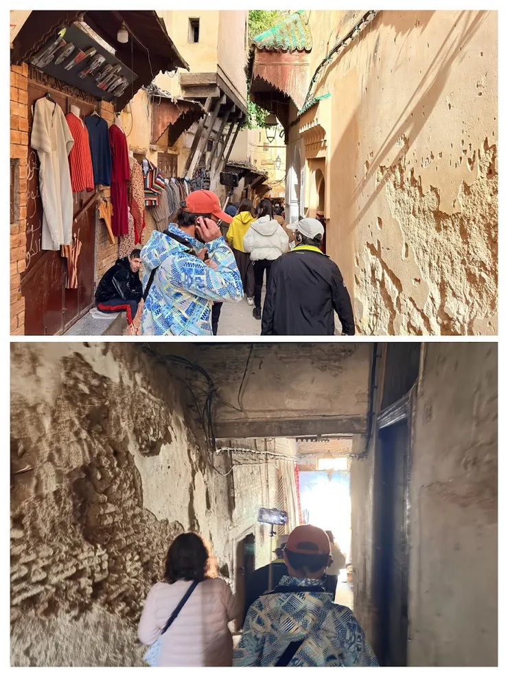 穿過巷弄，旁邊斑駁的牆，可看見原始的土塊面貌。