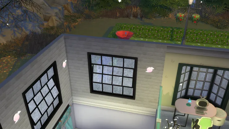 客廳其實有兩層樓高,所以在面開些大窗,一來透氣,二來增加自然光。