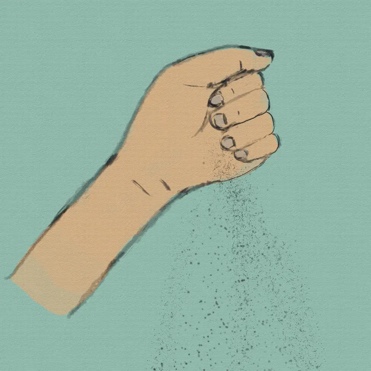 手中海沙流洩而下